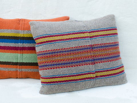 Hand-woven wool cushions in orange and yellow / <i>Almofadas de lã em laranja e amarelo</i>